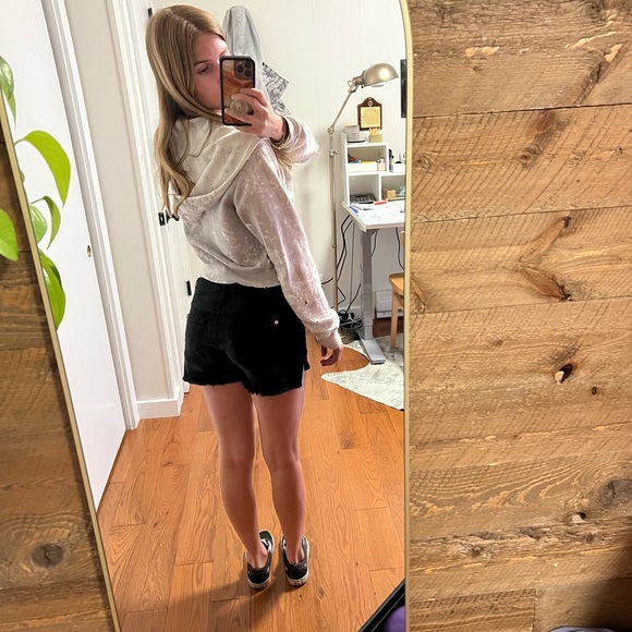 7 For All Mankind Mid-Rise Cutoff Shorts in Black - Picture 9 of 15